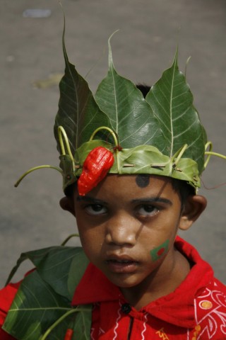 New years decoration - a little boy with a crown of leaves. Image by Abu Ala. Copyright Demotix