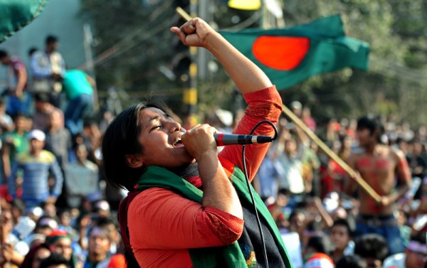 Students from different institutions join the protest demanding the death penalty for all war criminals at Shahbagh in the capital. In the Picture Lucky Akter shouting slogans. Image by Firoz Ahmed